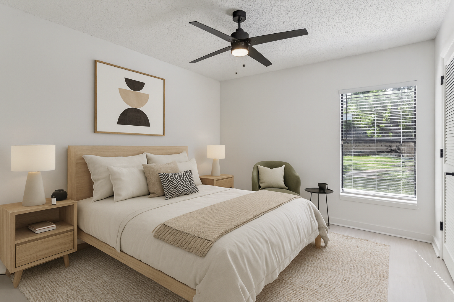 a bedroom with a ceiling fan and white bed at The Vista Bay
